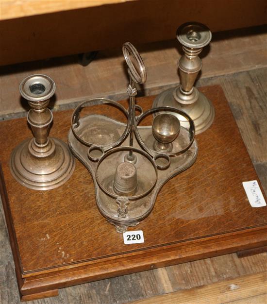 Silver plated canteen, pair candlesticks and a stand